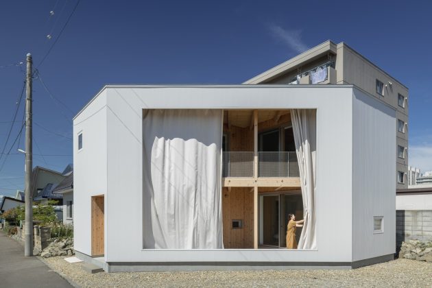 Opening Next to the Park House by Qukan in Japan