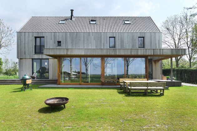 Wooden House with Facade of Reclaimed Wood by HOYT in The Netherlands