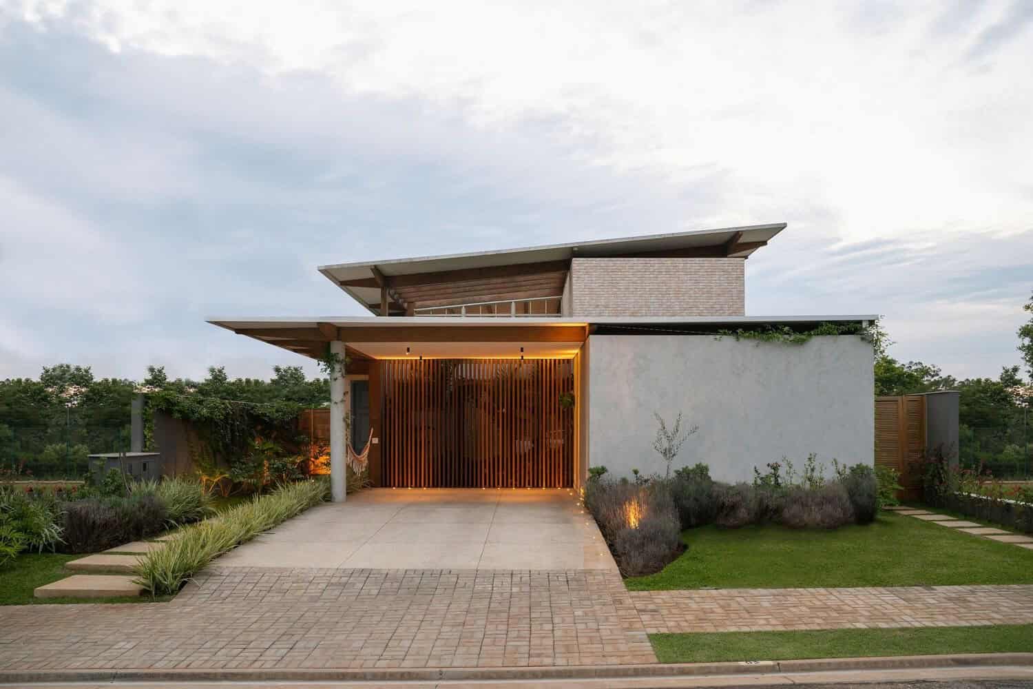 Contemporary modern house with unique architectural design, sleek lines, and innovative use of materials showcasing stylish residential architecture.