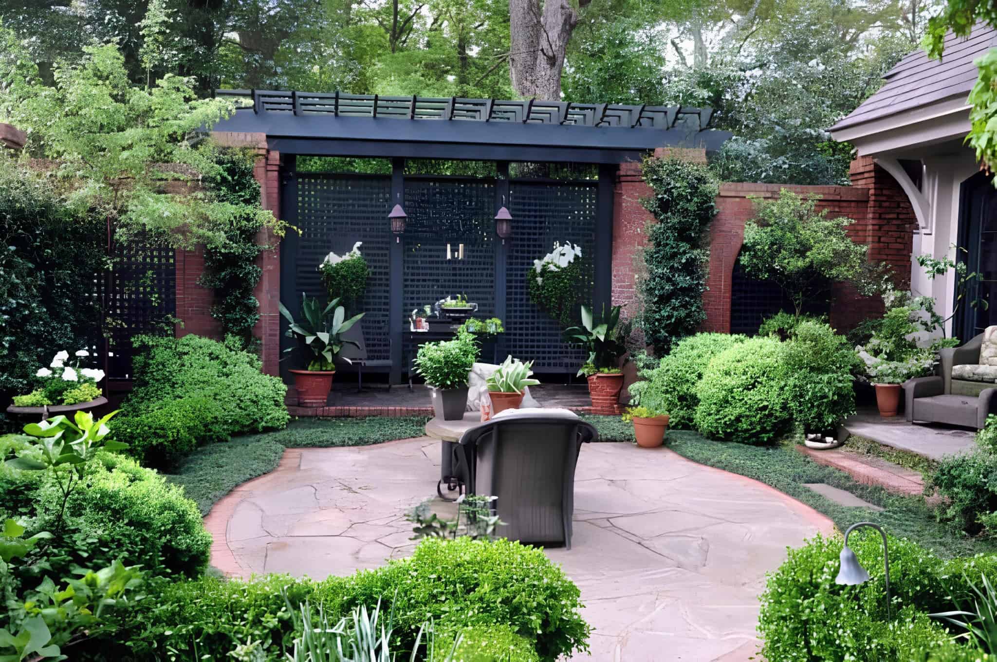 Traditional backyard pergola with black lattice panels and garden furniture