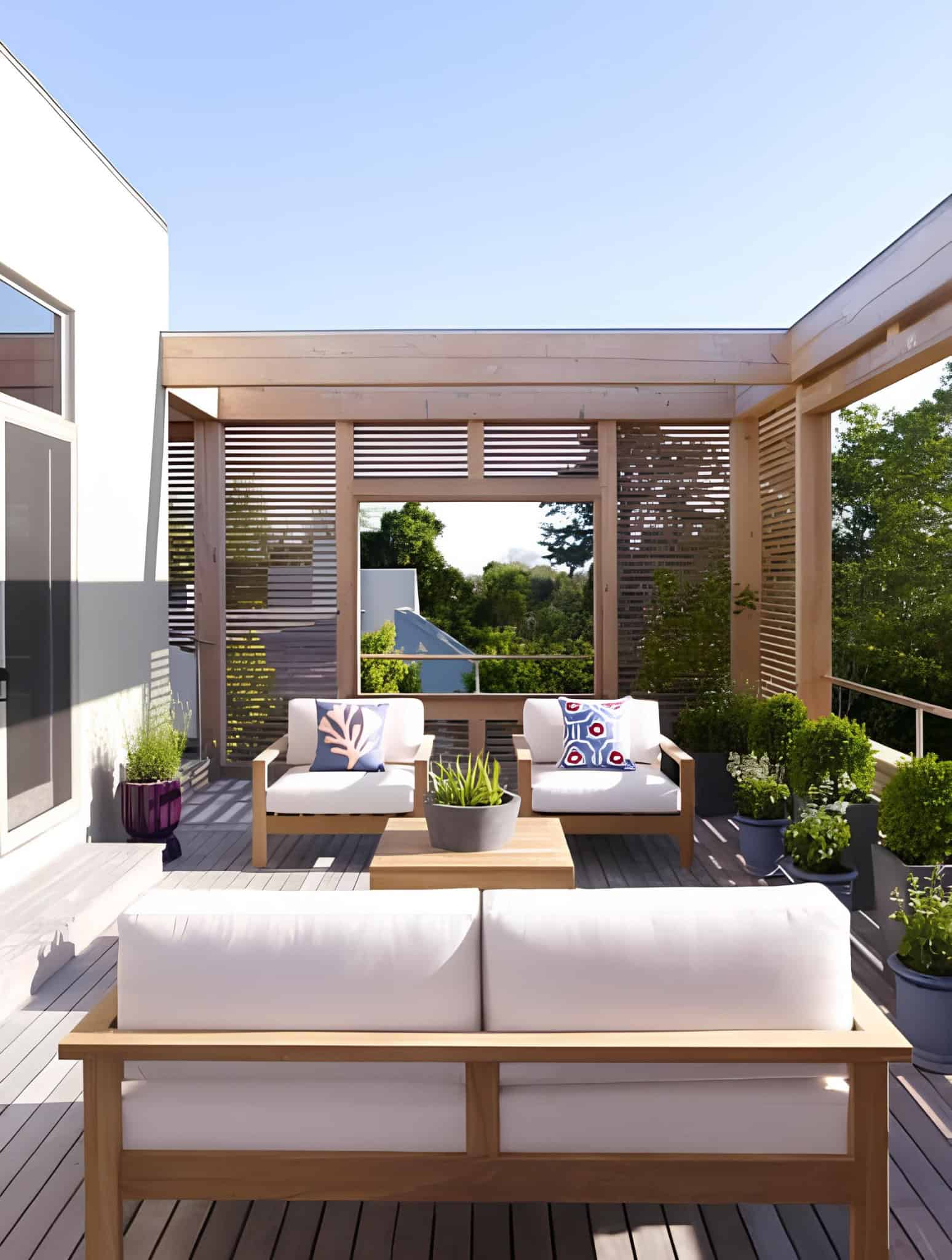 Minimalist rooftop patio with wood slat walls and white furniture
