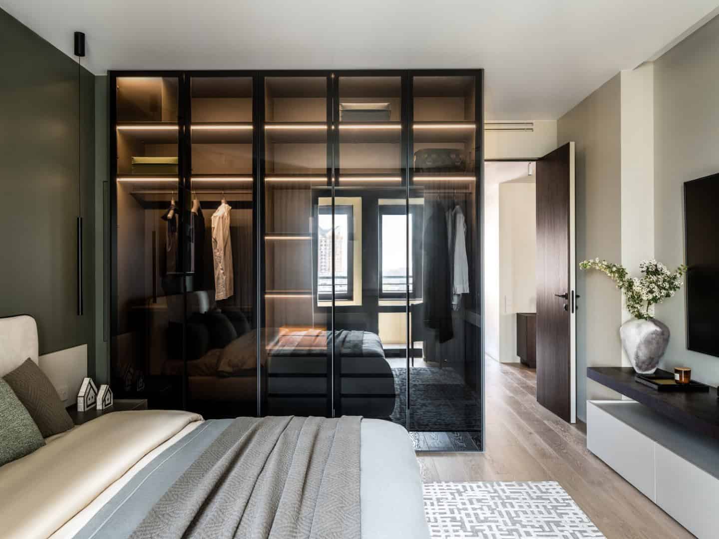 1,800 sf Apartment / Alexander Tischler / Russia Projector screen area with oak wall panels and concealed audio