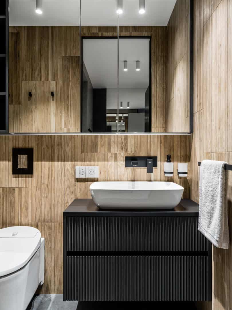 1,800 sf Apartment / Alexander Tischler / Russia Balcony lounge with oak veneer, twin armchairs, and Bonaldo tables