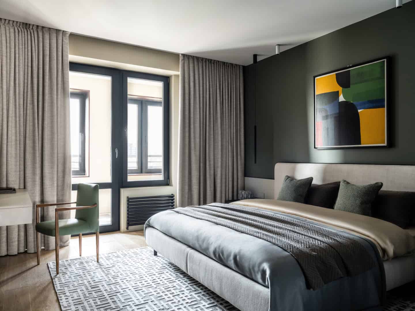 1,800 sf Apartment / Alexander Tischler / Russia Dark veneer kitchen with quartz island and integrated extractor hob