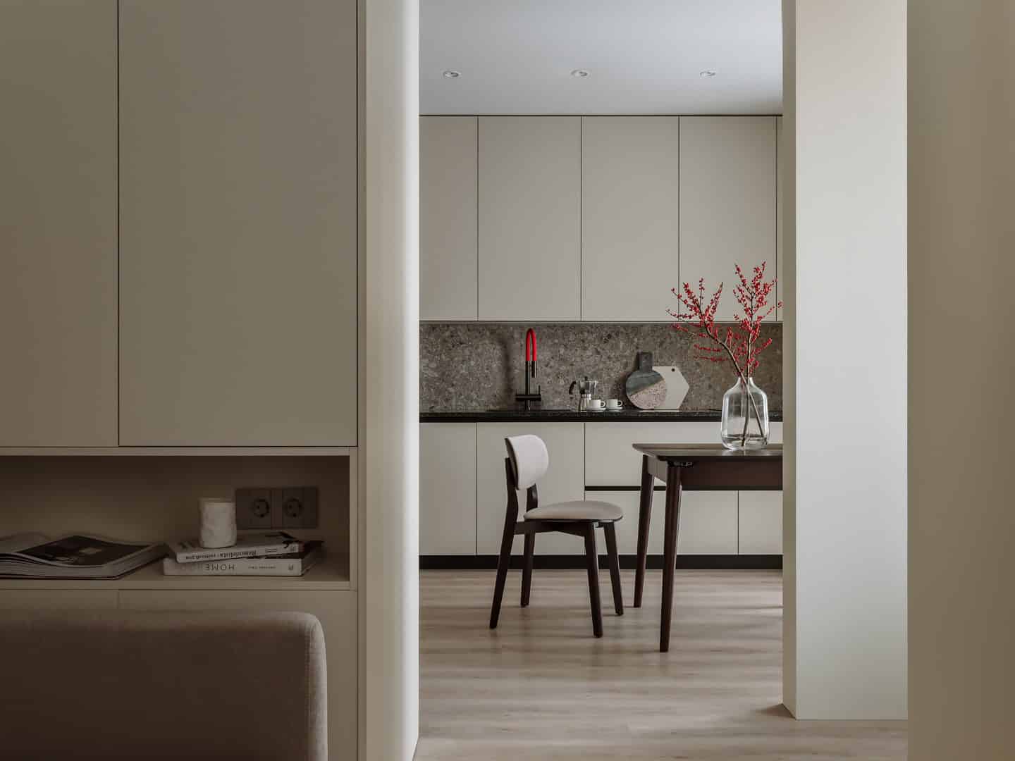 409 sf Apartment / Alexander Tischler / Russia Living zone with frosted sliding panels and storage wall