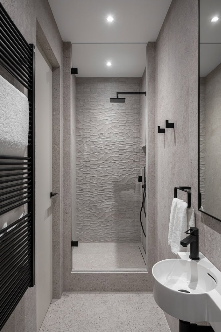 Apartment for a Software Developer / Alexander Tischler / Russia Bathroom with yellow vanity and modern shower