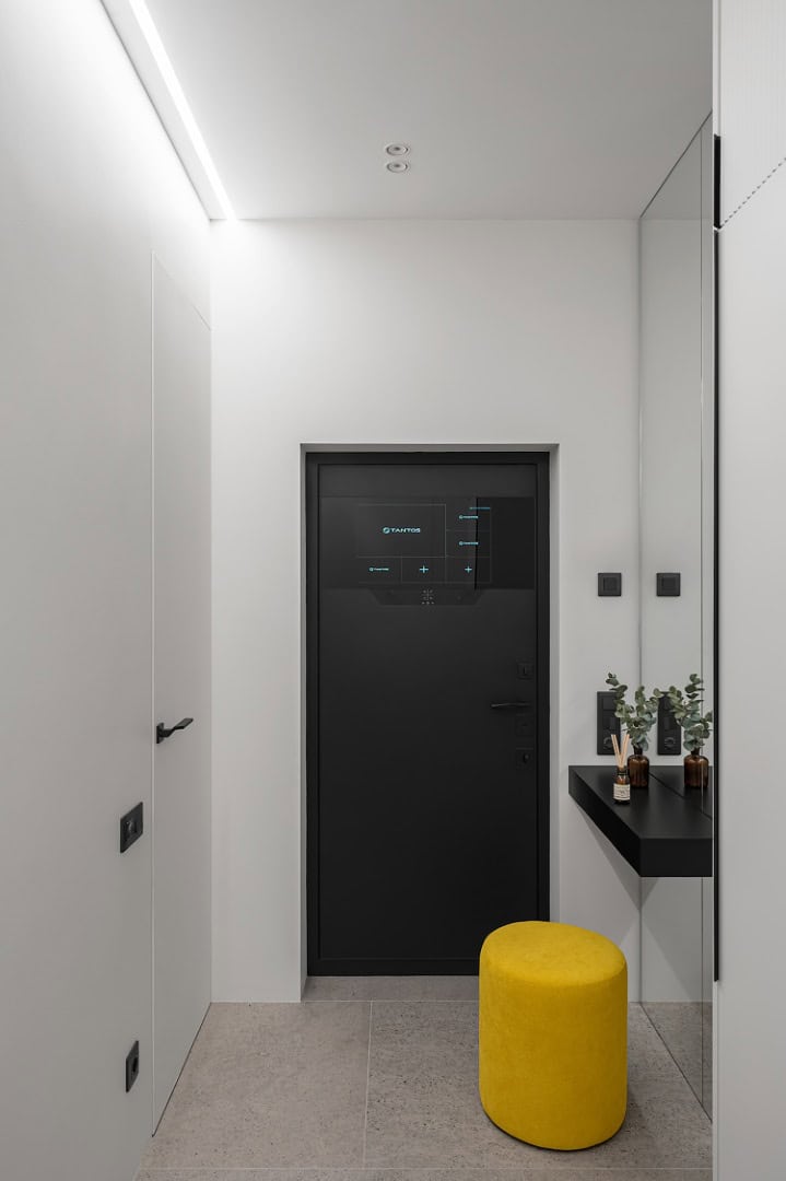 Apartment for a Software Developer / Alexander Tischler / Russia Entry column cabinet concealing laundry appliances