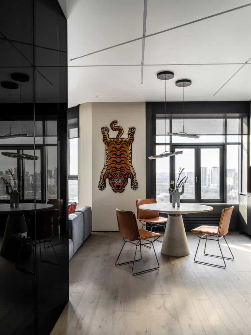 Apartment with a Glass Home Office / Alexander Tischler / Russia Master bathroom with monolithic tub block and bright finishes