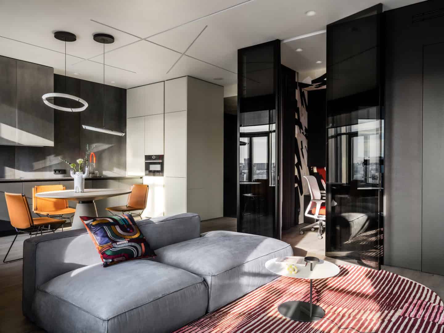 Apartment with a Glass Home Office / Alexander Tischler / Russia Quartz sink and illuminated storage completing the suite