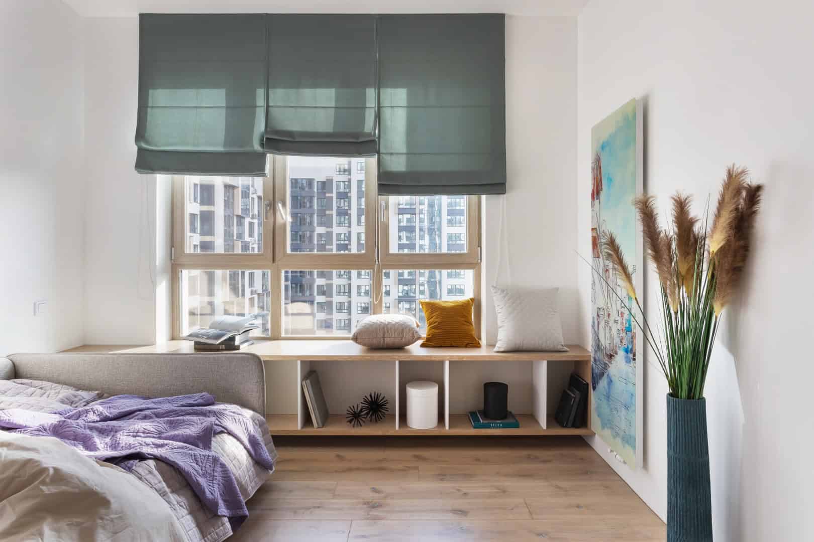 Colorful Apartment / Alexander Tischler / Russia Dining area in white with sculptural chairs