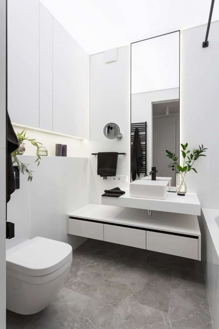 Colorful Apartment / Alexander Tischler / Russia Teen room desk at entry with shelving divider beyond