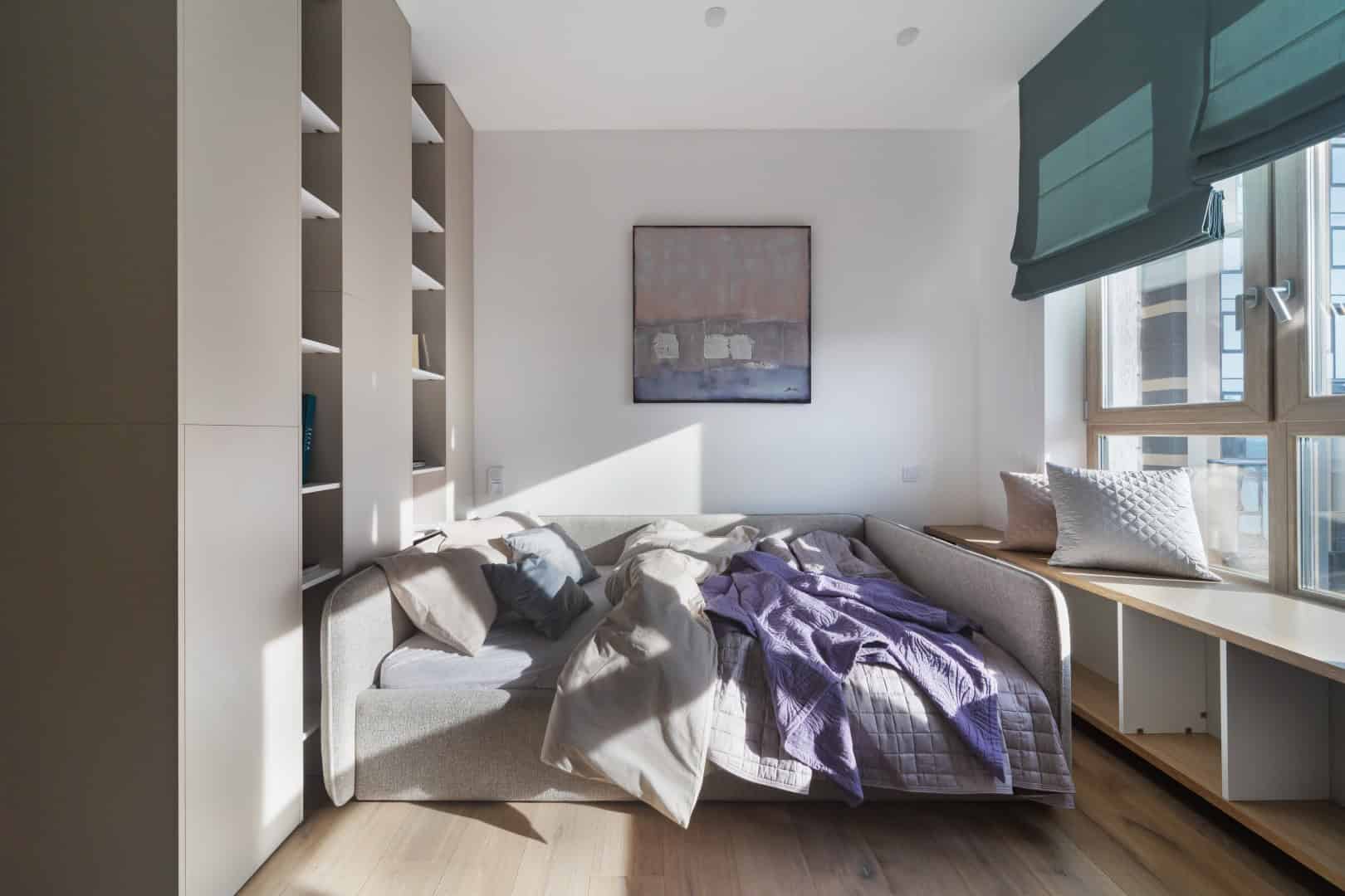 Colorful Apartment / Alexander Tischler / Russia Laundry zone with tall cabinet and open shelves