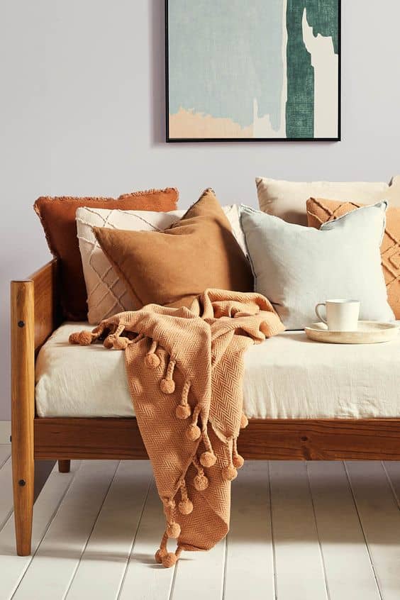 Embrace Autumn with Terracotta, Mustard, and Deep Green Cushion Combos