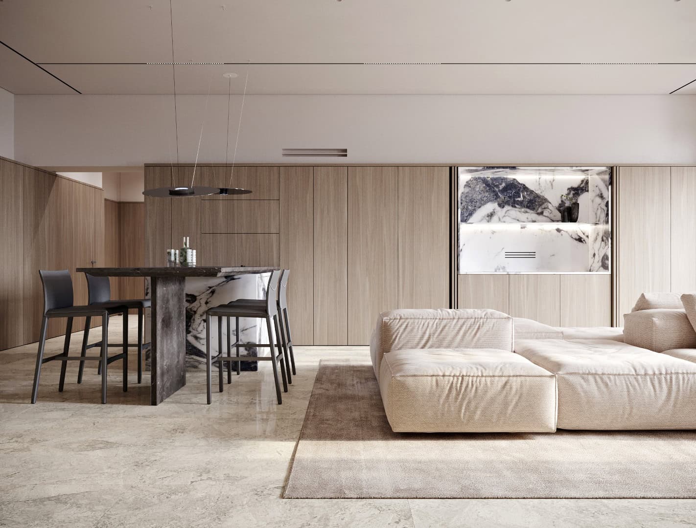 A modern living room with a large sofa and a dining table