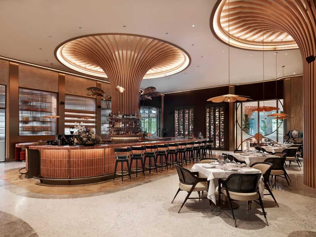 Luxurious modern restaurant interior with wood accents, sleek bar design, elegant lighting, and contemporary furniture, showcasing innovative architectural art and interior design elements.