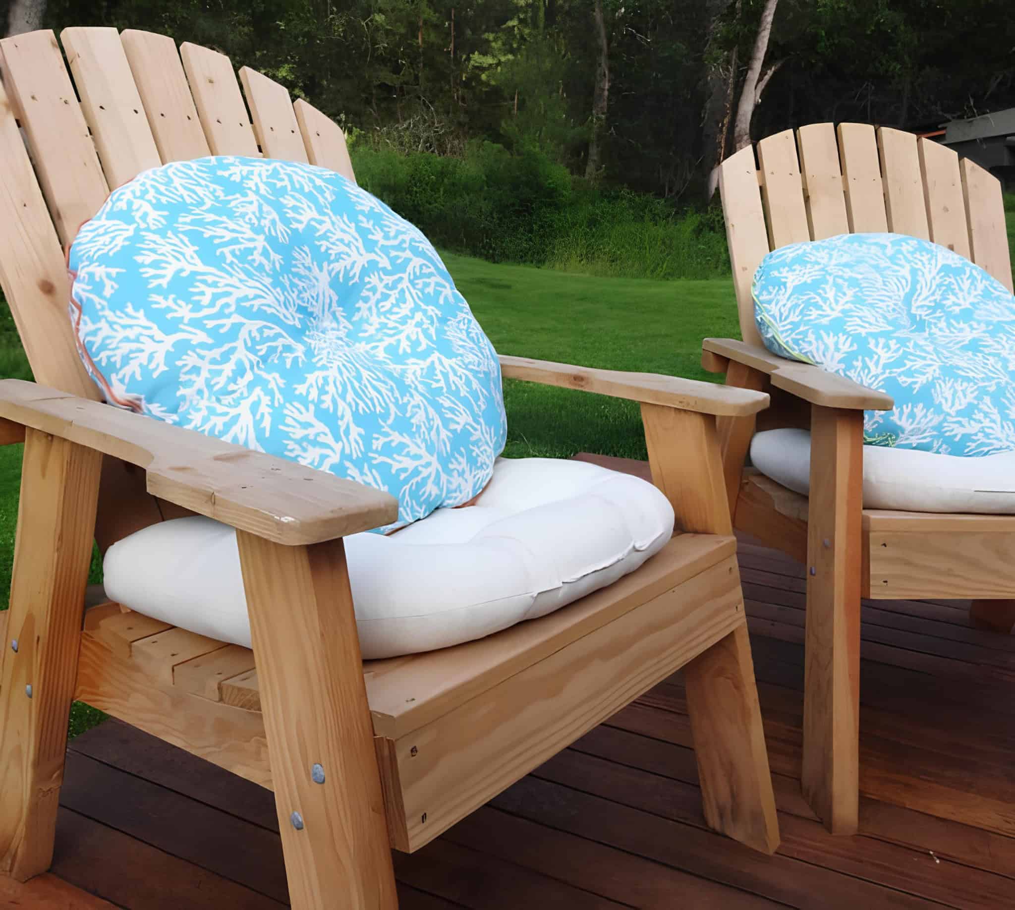 Blue and White Round Cushion on Adirondack Chair Outdoor chairs with blue and white round cushions for comfortable lounging