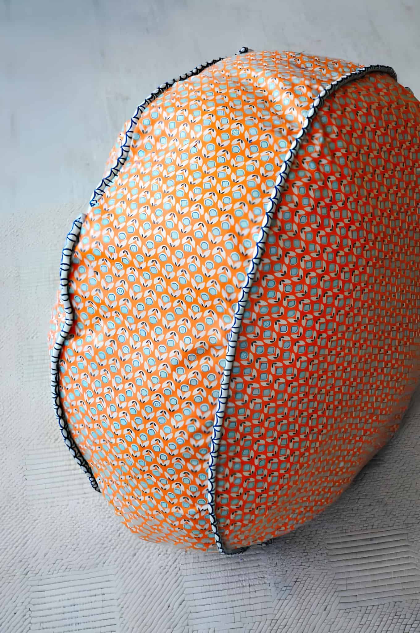 Orange Patch DIY Floor Ottoman Colorful patterned fabric used to make a round DIY ottoman