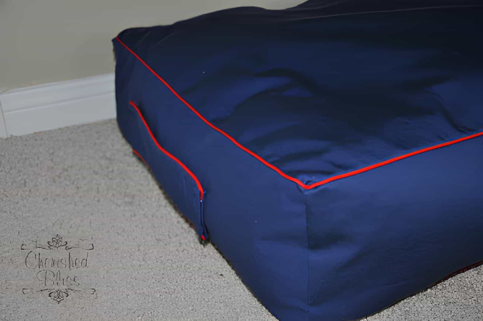 Square Navy Floor Cushion with Red Trim Large square navy blue floor cushion with bold red edging