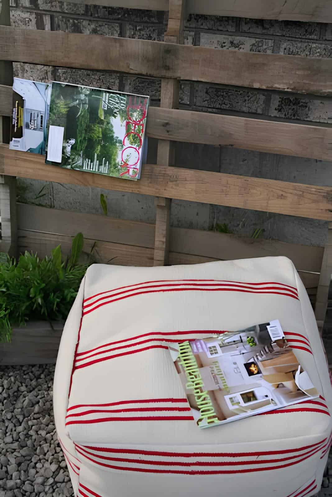 Striped Fabric DIY Floor Cushion Ottoman White ottoman with red stripes used outdoors beside wooden pallet wall