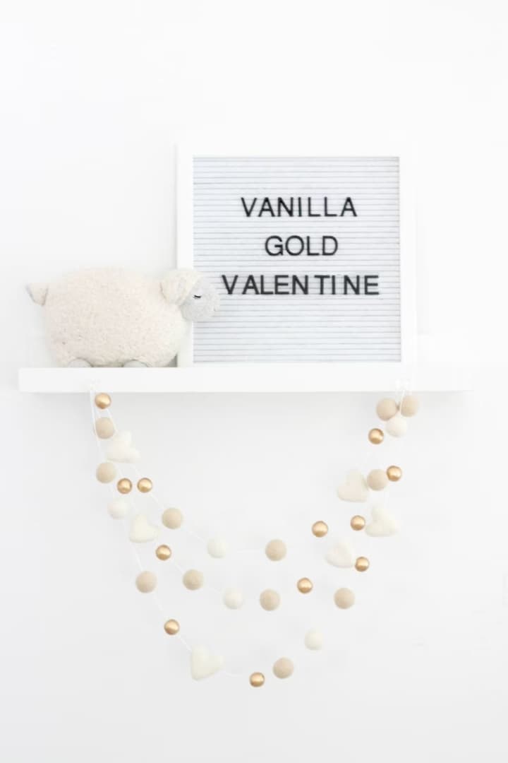 10. Vanilla Gold Valentine Felt Ball Garland 10. Vanilla Gold Valentine Felt Ball Garland