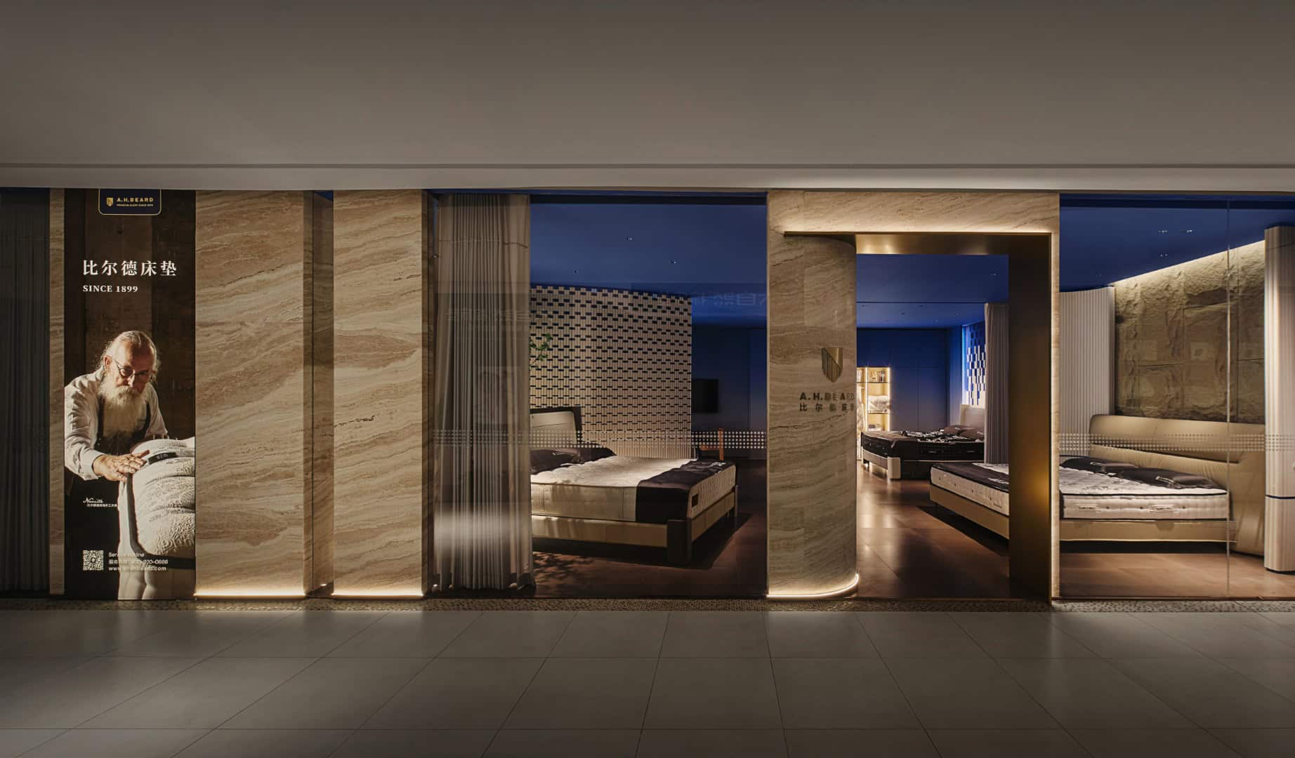 Luxurious modern bedroom display in a high-end furniture showroom, featuring elegant bed designs, sophisticated lighting, and contemporary interior architecture for stylish bedroom ideas.