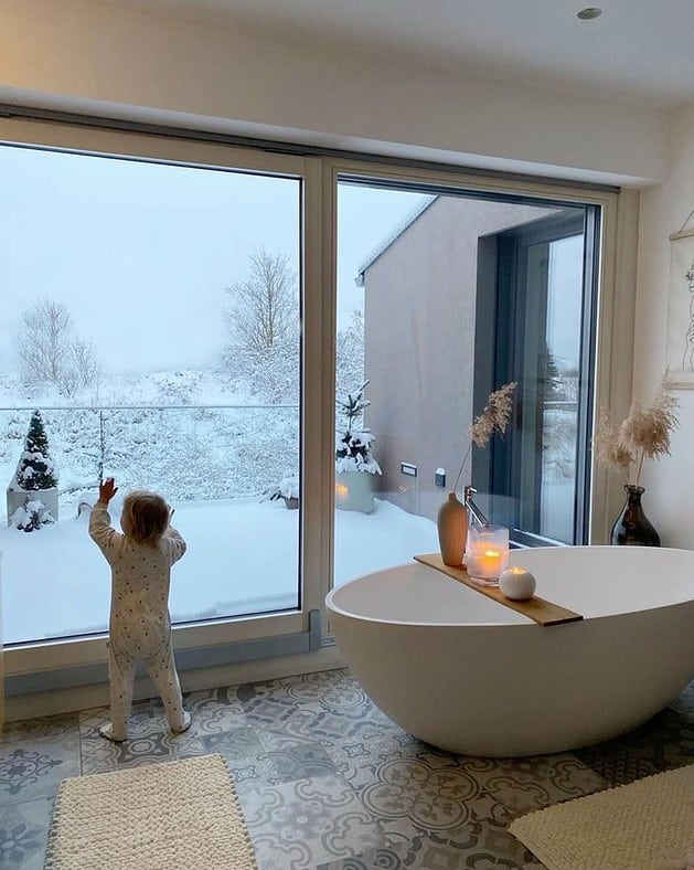 The Magic of Large Winter Windows in Your Bathroom