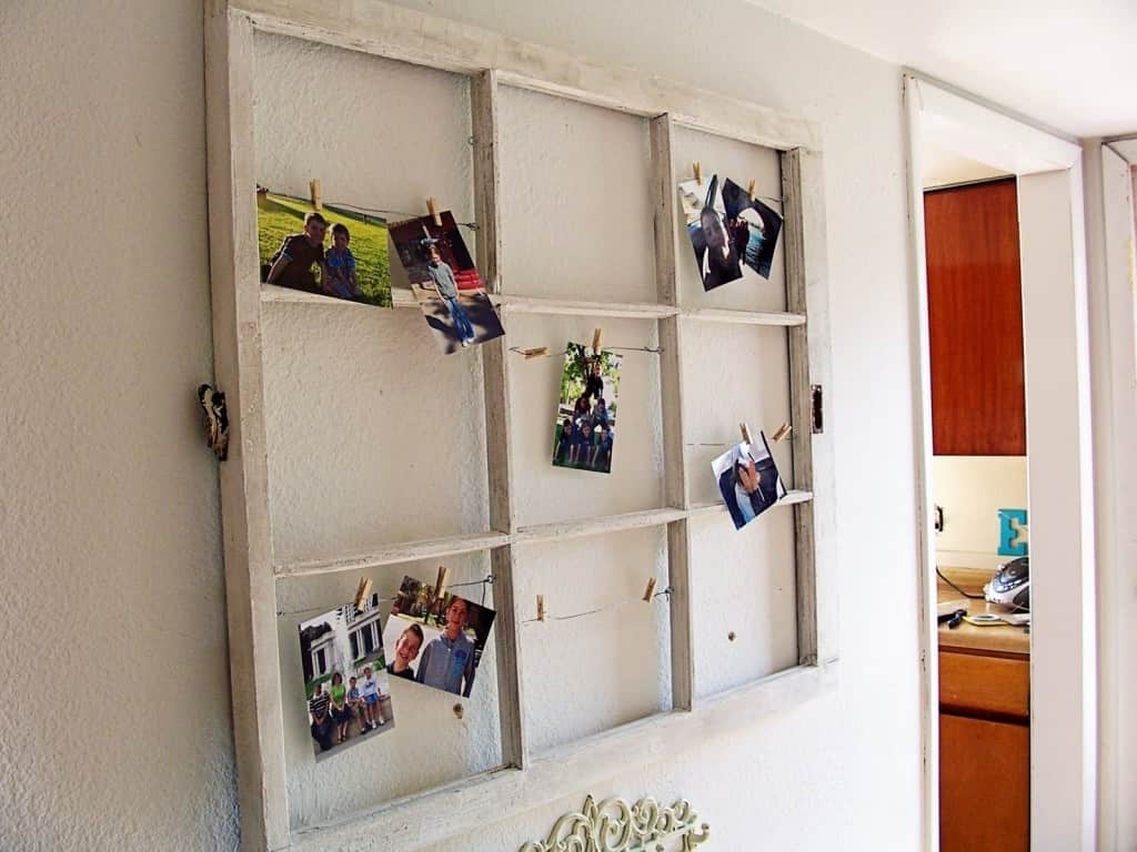 10. Colorful Binder Clips + Family Photos = Outstanding Window Panes 10. Colorful Binder Clips + Family Photos = Outstanding Window Panes