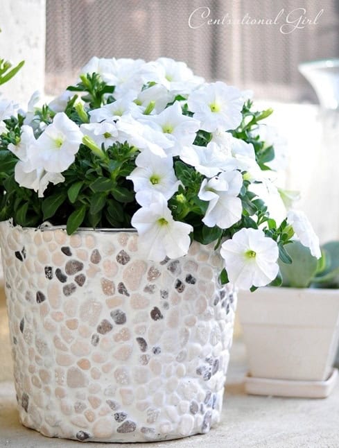 11. DIY Rock Covered Bucket Planter