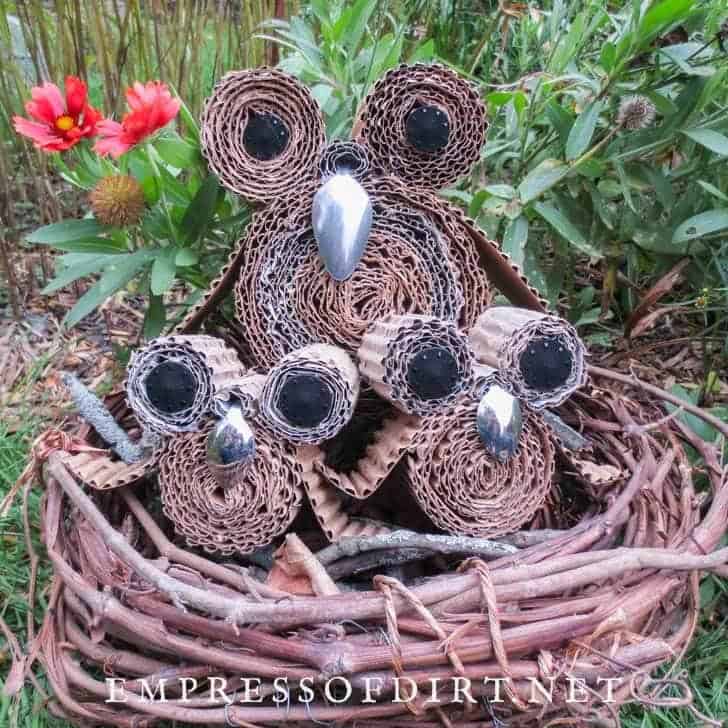 9. Upcycled Cardboard Garden Owls