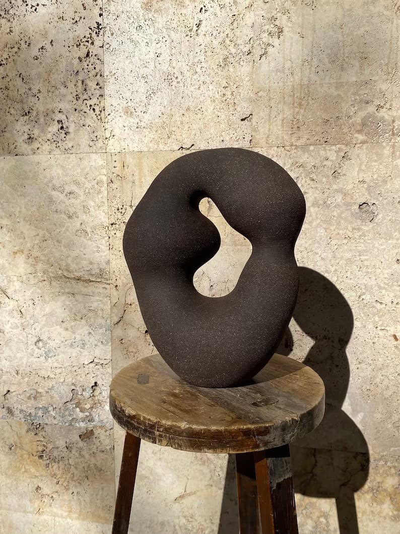 1. Black abstract ceramic sculpture 1. Black abstract ceramic sculpture