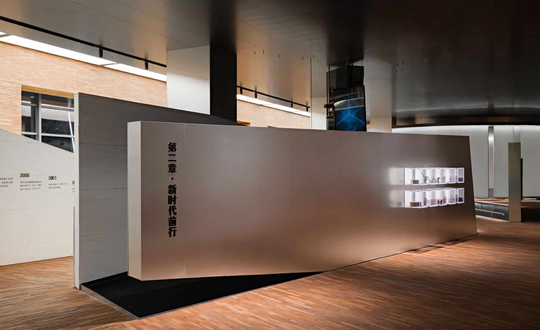 Black Mirror Hall Black mirrored enclosure intensifying reflections of light and visitors.