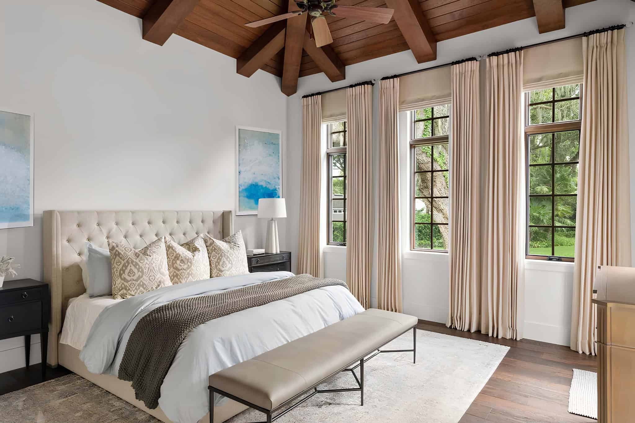 Mediterranean Bedroom Orlando Indoor-outdoor Mediterranean bedroom with vaulted wood ceiling and pool access.