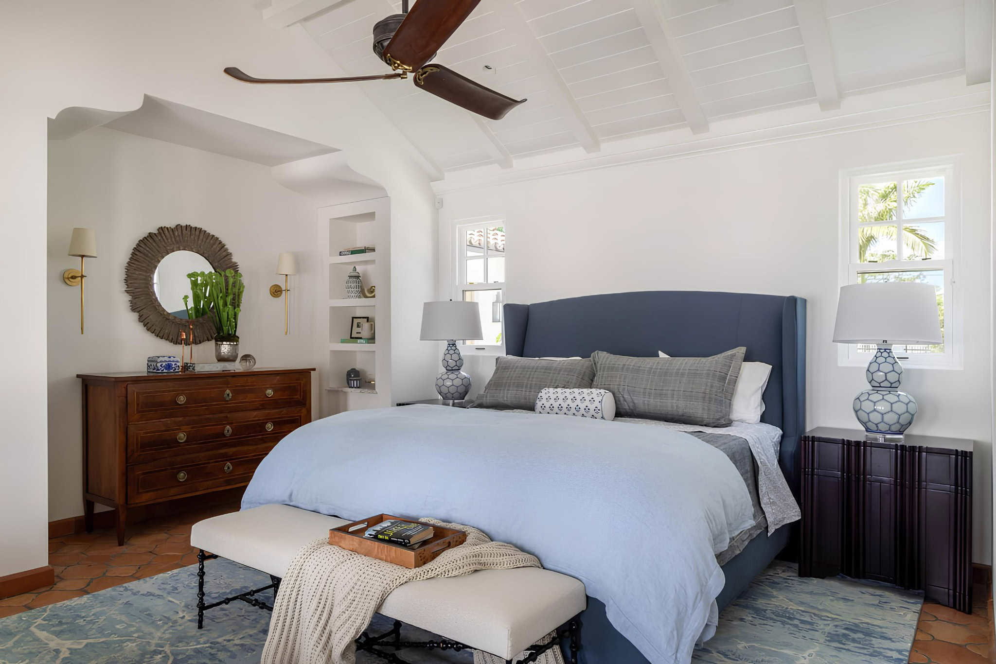 Mediterranean Bedroom Tampa Blue-accented Mediterranean bedroom with arched architecture and classic decor.