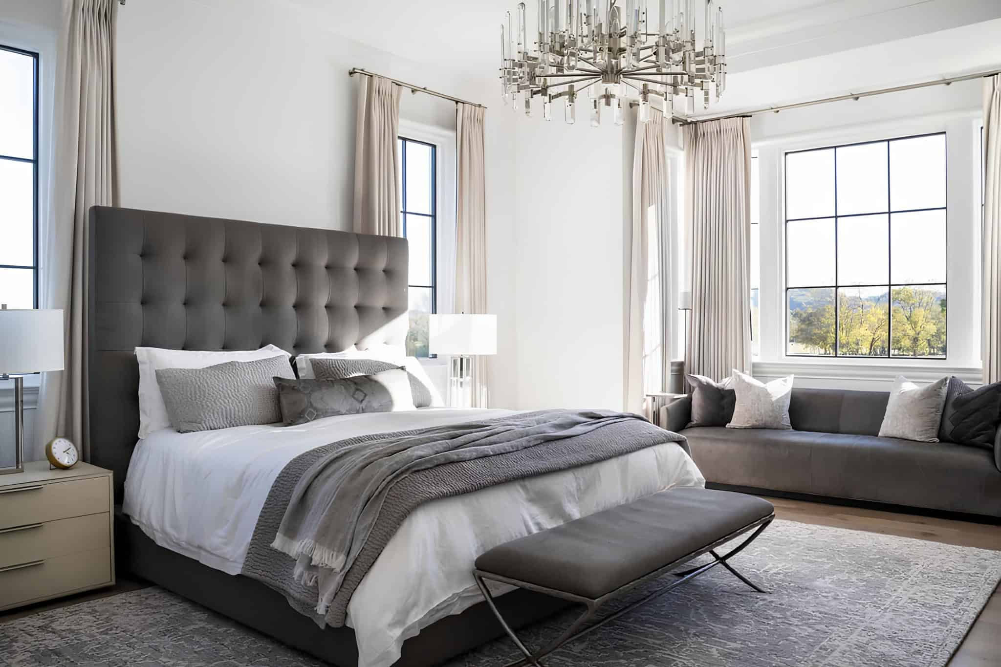 Porto Del Cielo Bedroom Design Sophisticated bedroom with gold chandelier and modern classic design.