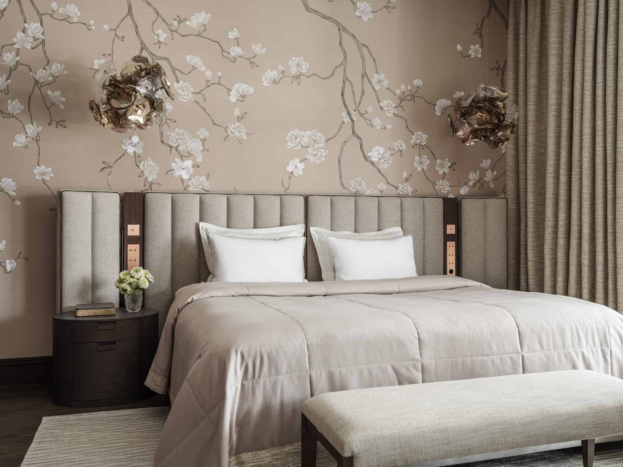 Bathroom with Marble Tub and Golden Details Luxurious bathroom with marble walls, golden fixtures and round soaking tub.