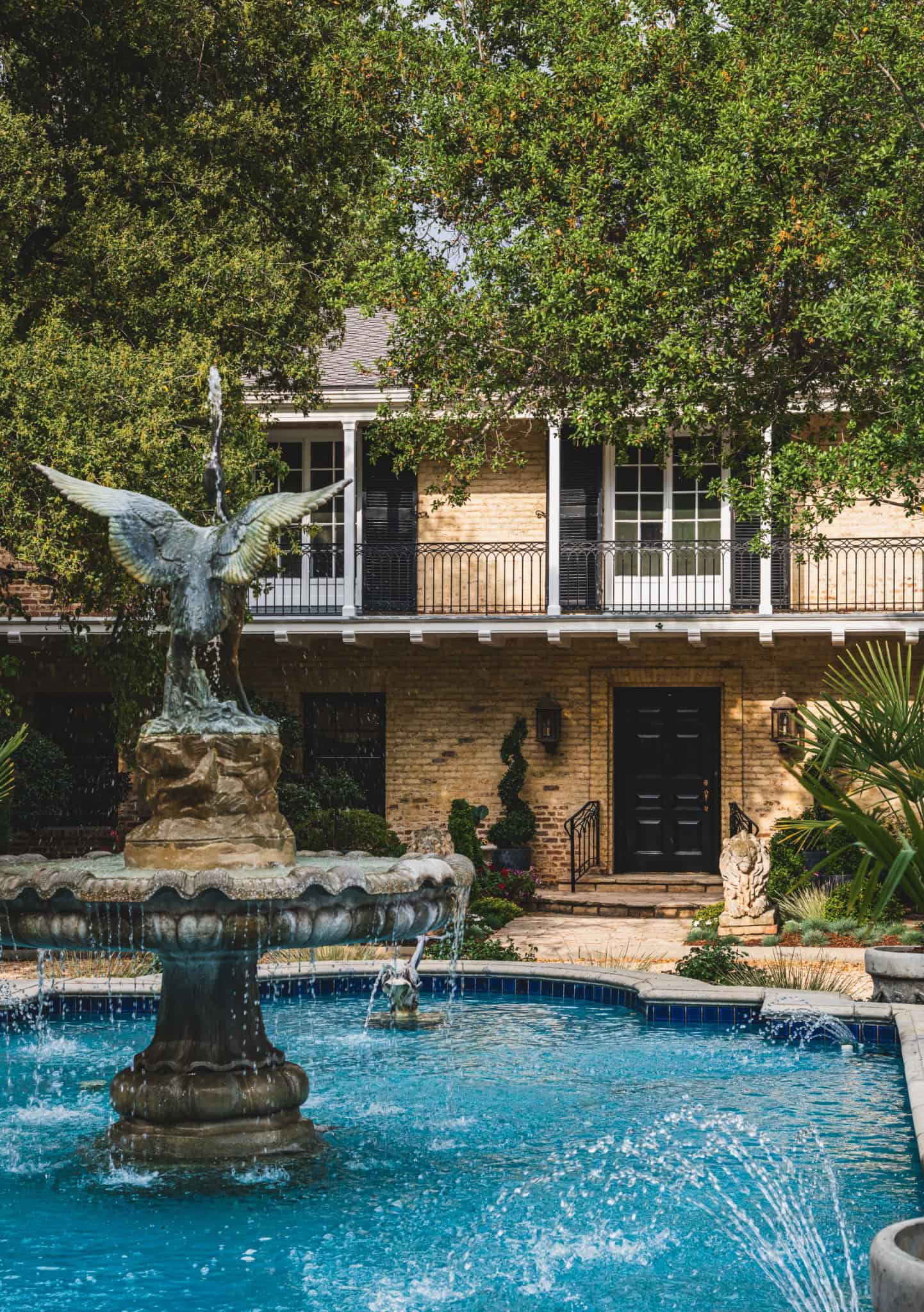 Bauer Estate Poolside Aerial Photo Bird's eye view of Bauer Estate with lush landscape and private pool area.