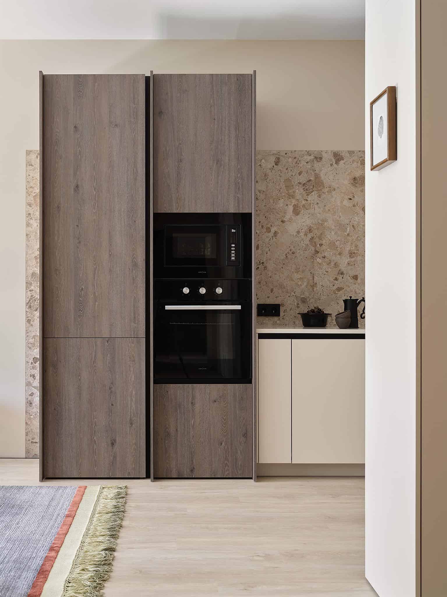 Beige Kitchen and Dining Area Combination Elegant combination of beige kitchen and dining area with modern natural textures.