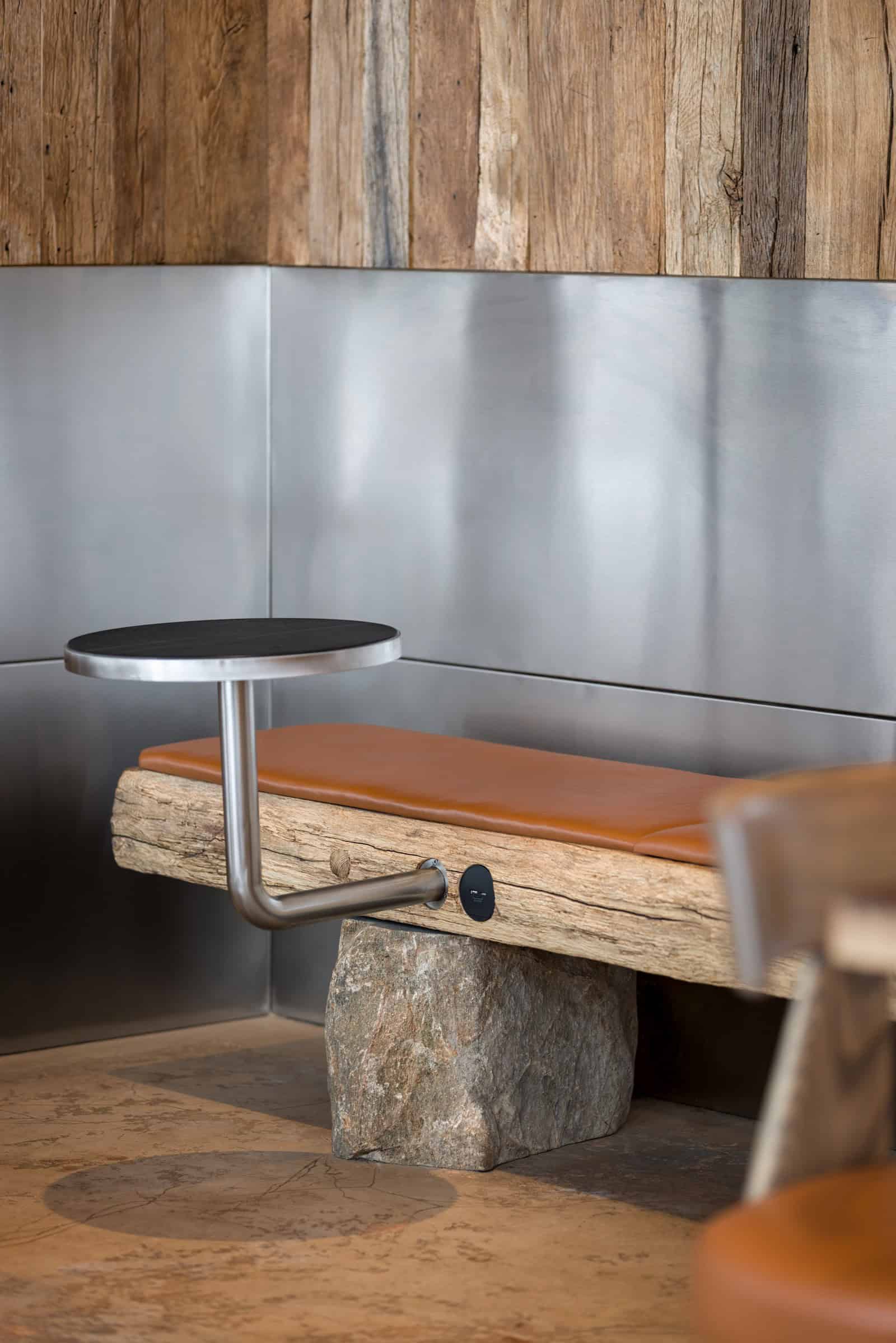 Coffee Shop Kovel Bench Stainless Steel Wall Leather-cushioned bench and stainless steel wall inside modern coffee shop