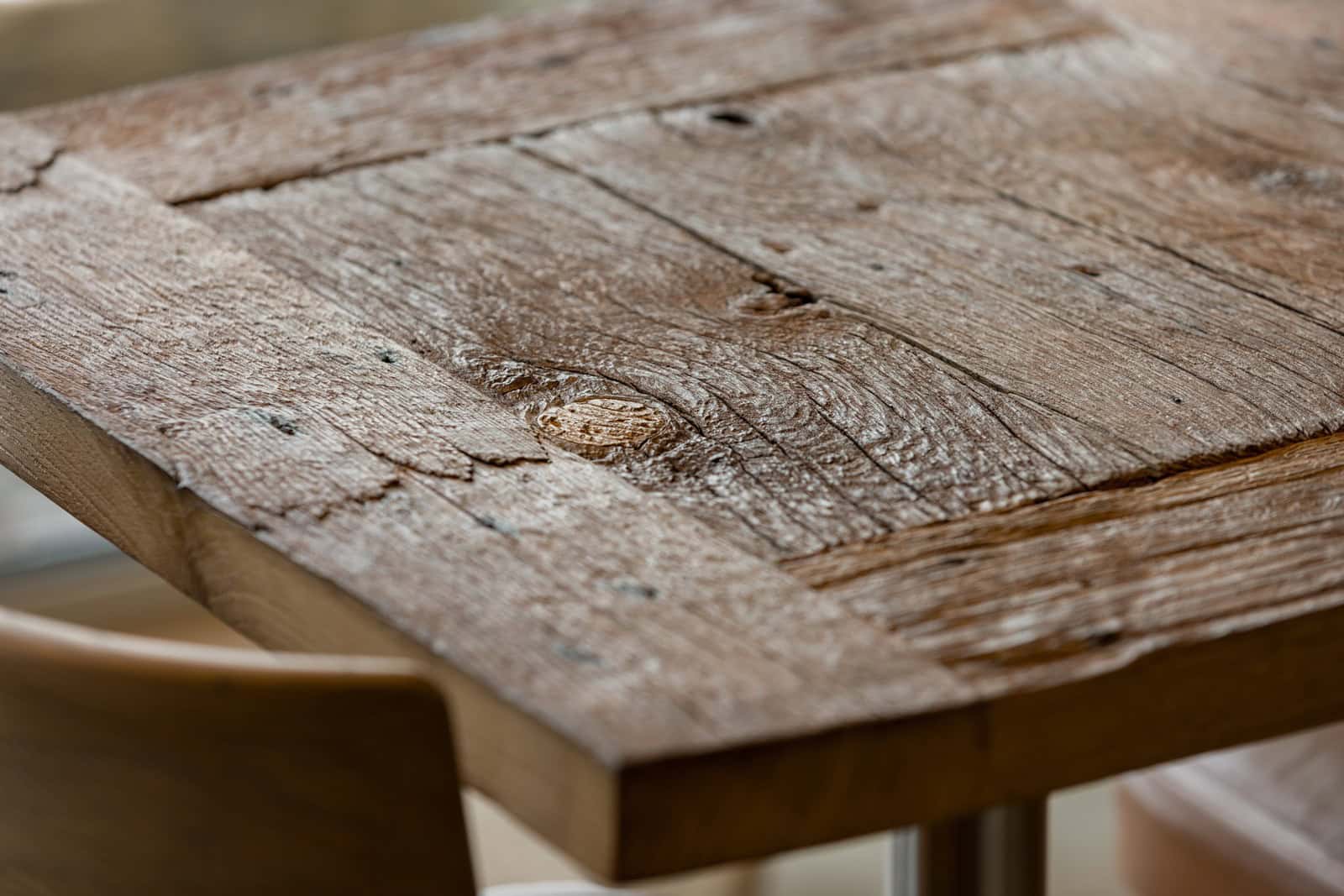 Coffee Shop Kovel Organic Ceiling Over Counter Branch-like ceiling installation over coffee counter with warm lighting and stainless steel finish