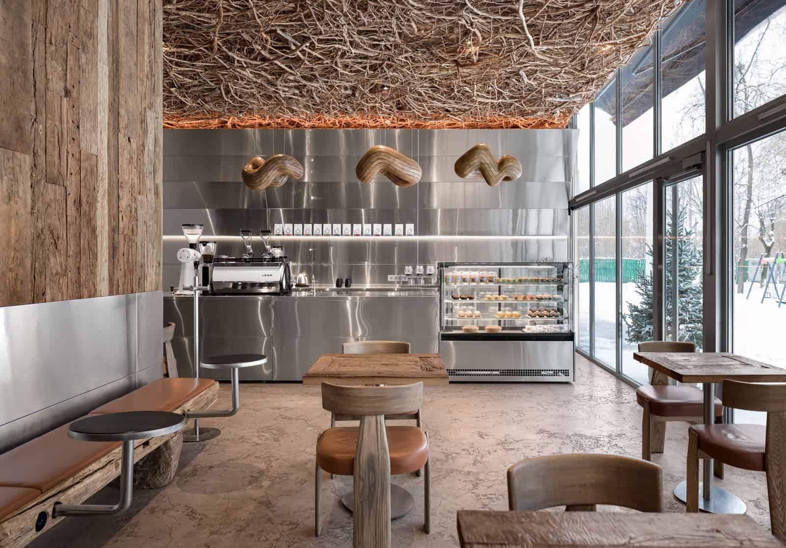 Coffee Shop Kovel Wooden Table Surface Textured wooden tabletop made from reclaimed wood with visible grain and nails