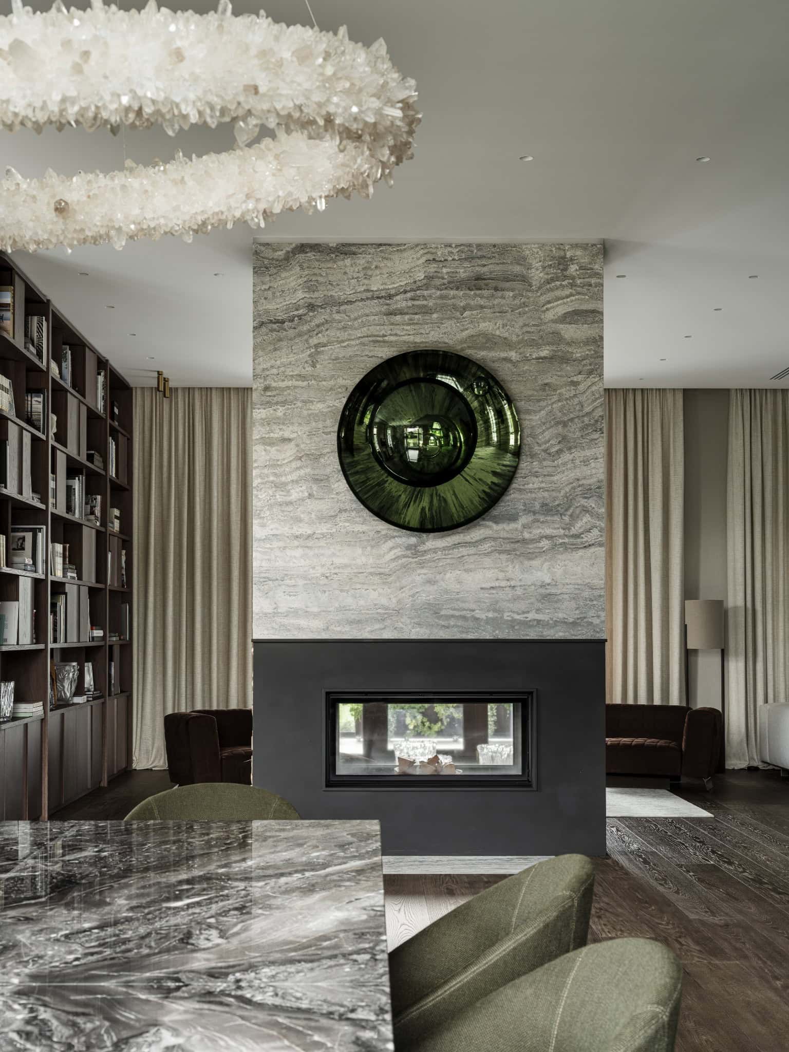 Contemporary Fireplace with Green Glass Art Textured fireplace wall with striking green glass circular art above.