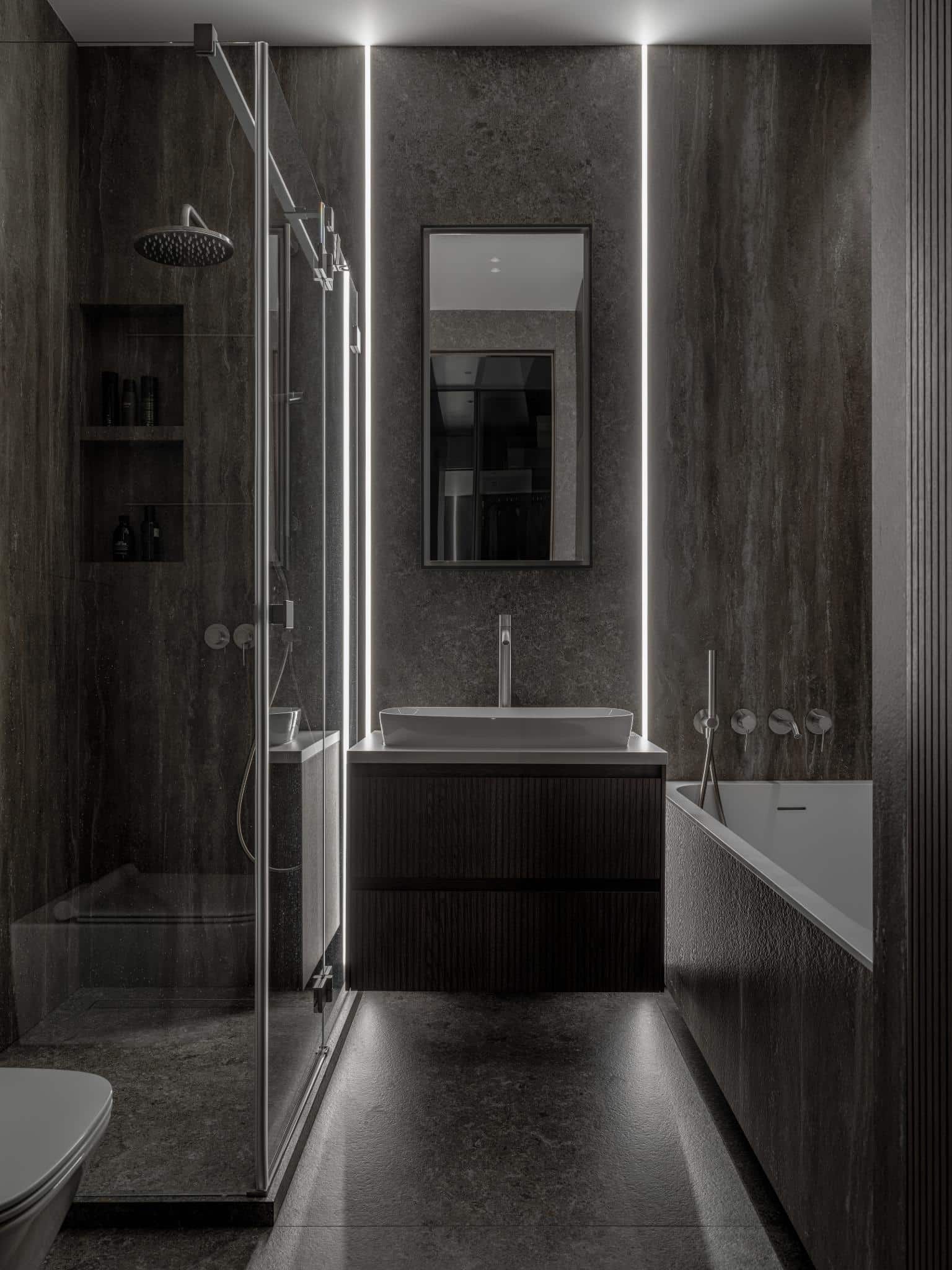 Dark Bathroom Interior With Vertical Lighting Dark bathroom interior with vertical lighting.