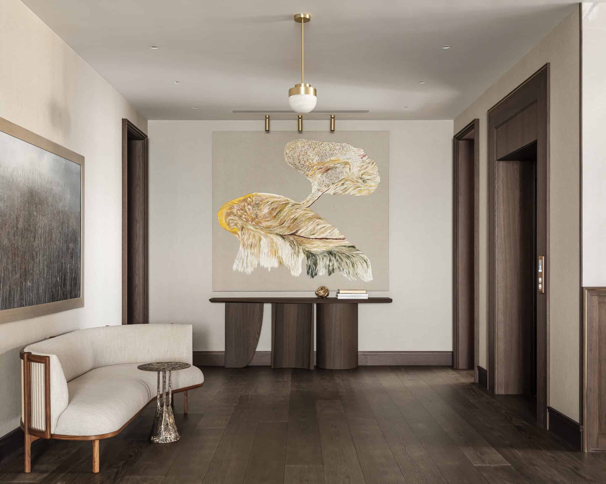 Elegant Hallway with Modern Art Spacious hallway with dark floors, console table, and large contemporary canvas.