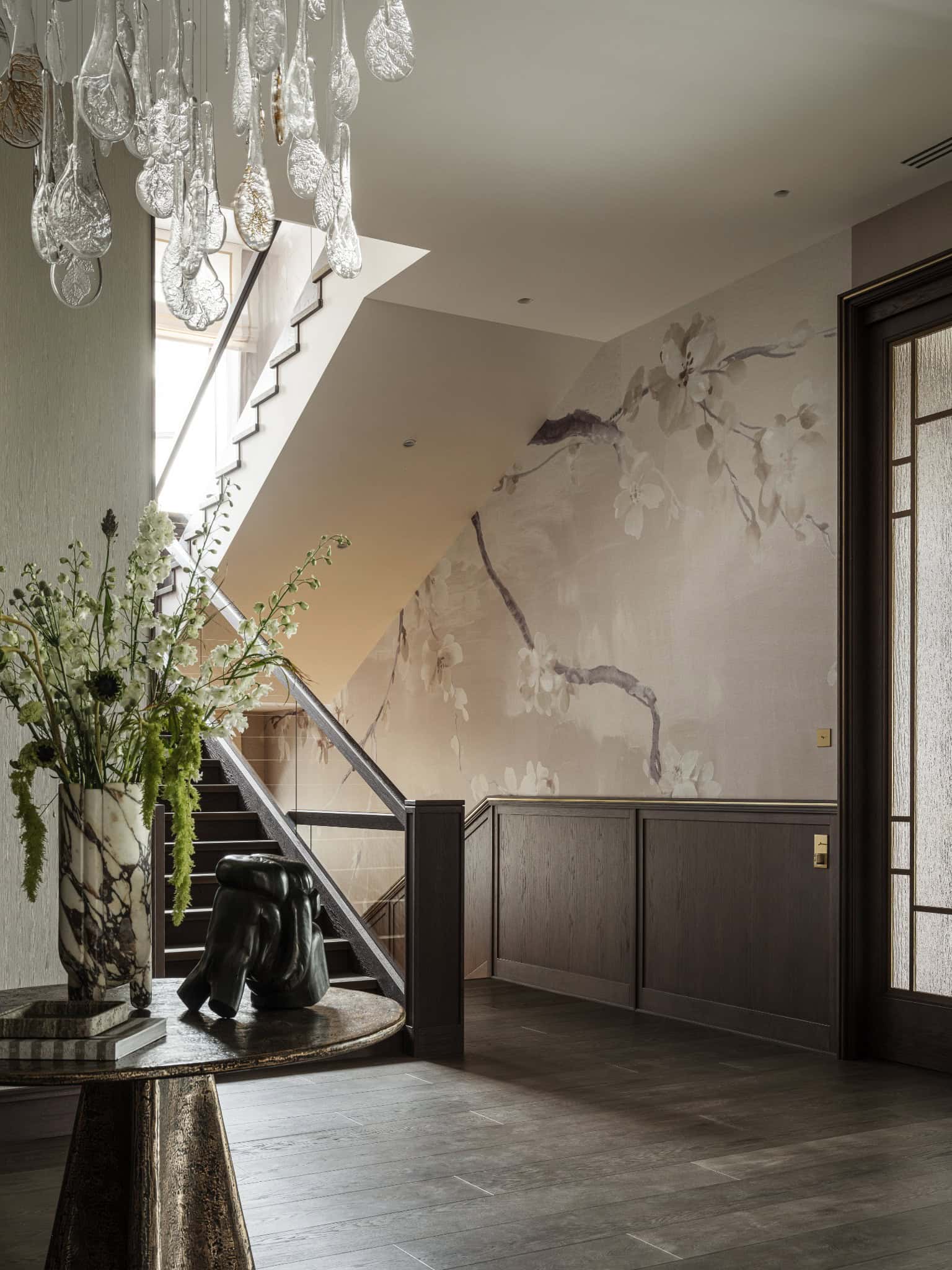 Foyer Staircase with Floral Wall Mural Stairway wall painted with delicate floral art in a soft modern interior.