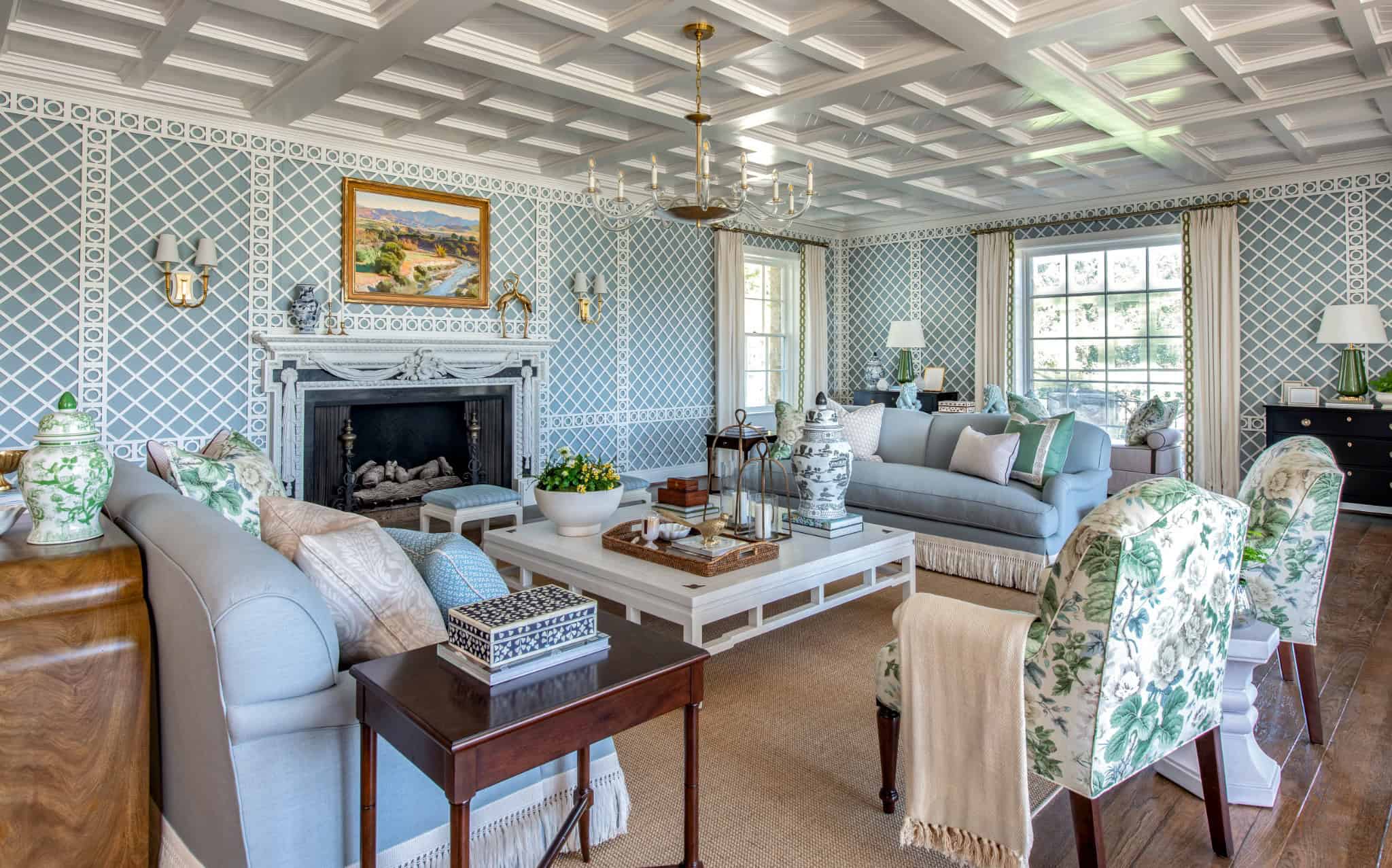 Grand Living Room Blue Patterned Walls Grand living room featuring a coffered ceiling, blue lattice walls, and floral patterned seating.