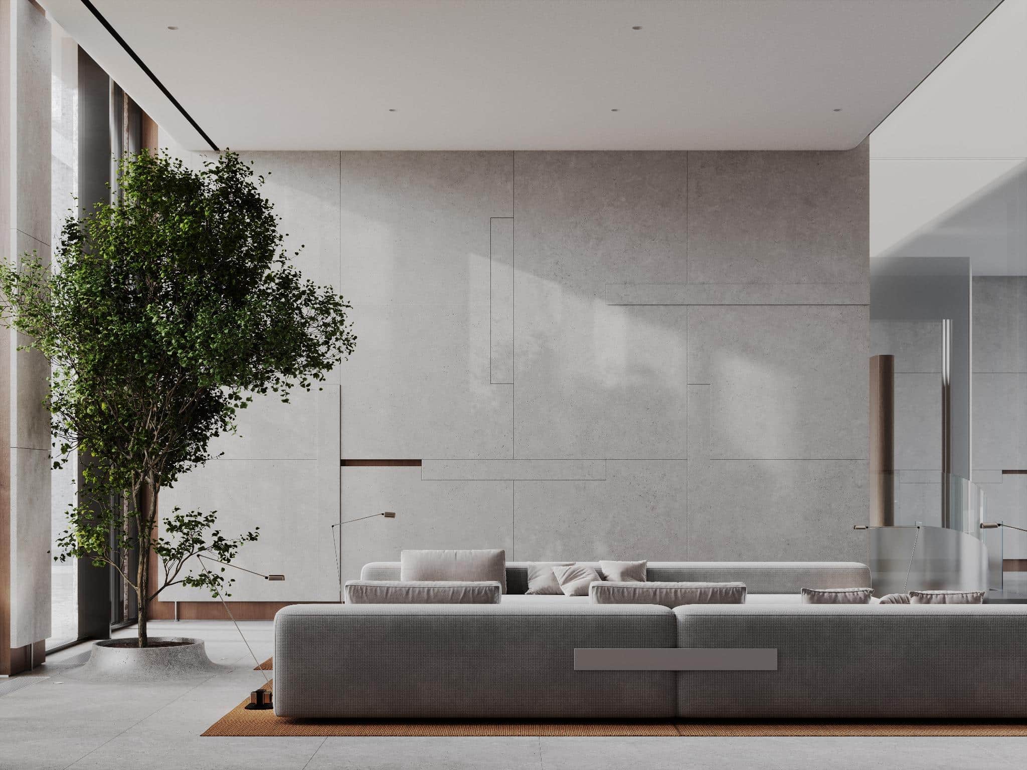 Lobby Seating Area with Interior Garden Spacious lobby lounge with plush sofas and a tree planted in a sunken garden planter.