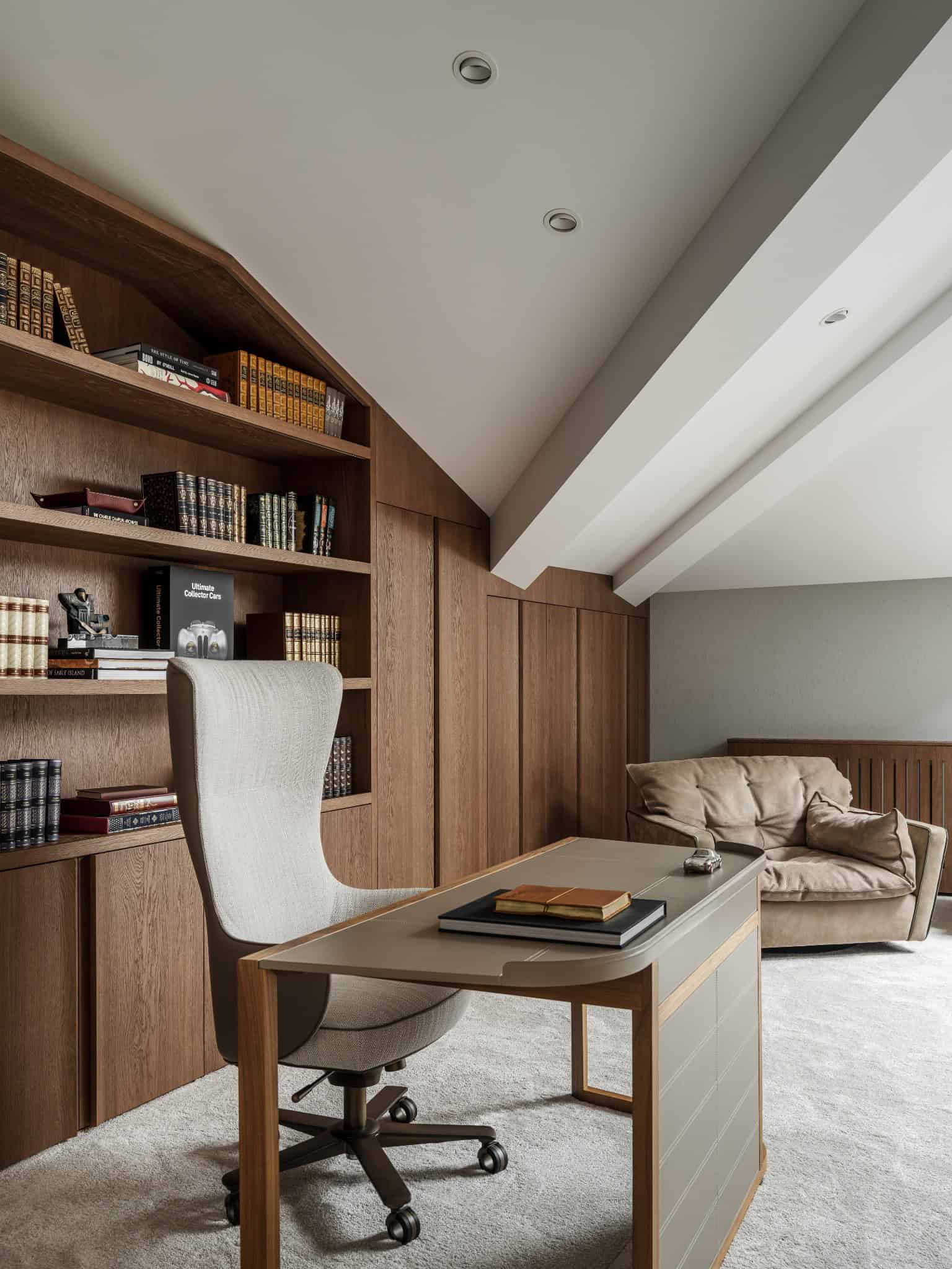 Luxury Office with Collector Books Elegant office filled with collector edition books and soft leather chair.
