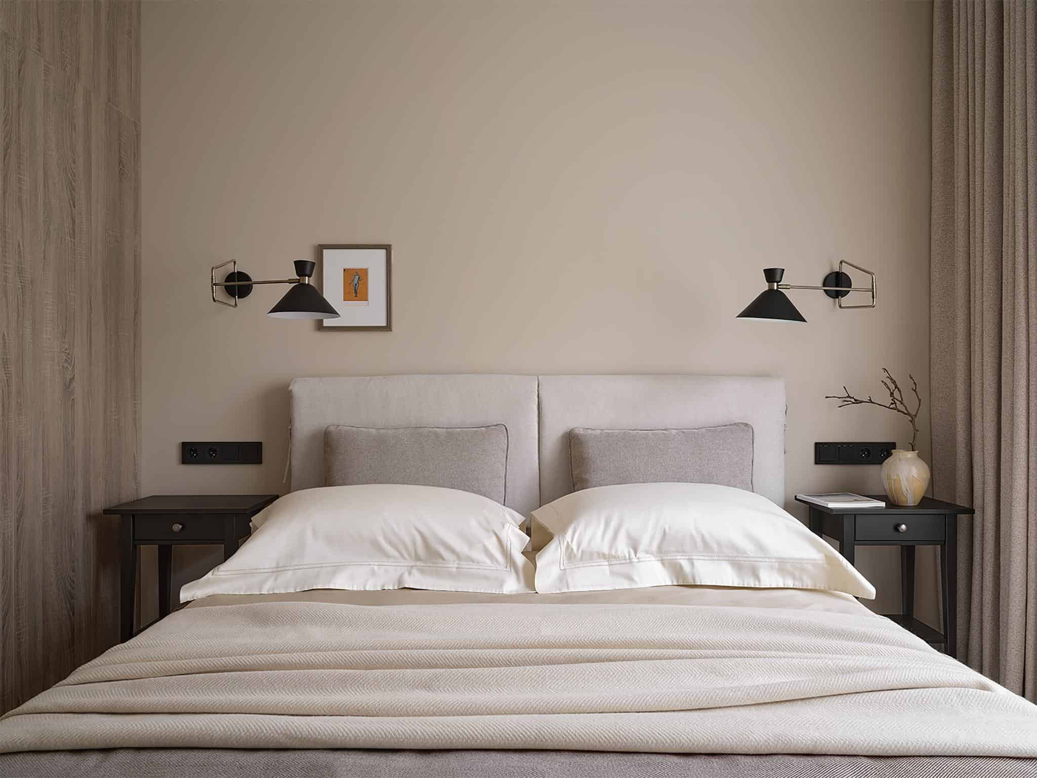 Master Bedroom Design with Soft Lighting Modern master bedroom with neutral tones, soft headboard, and elegant wall-mounted lighting.