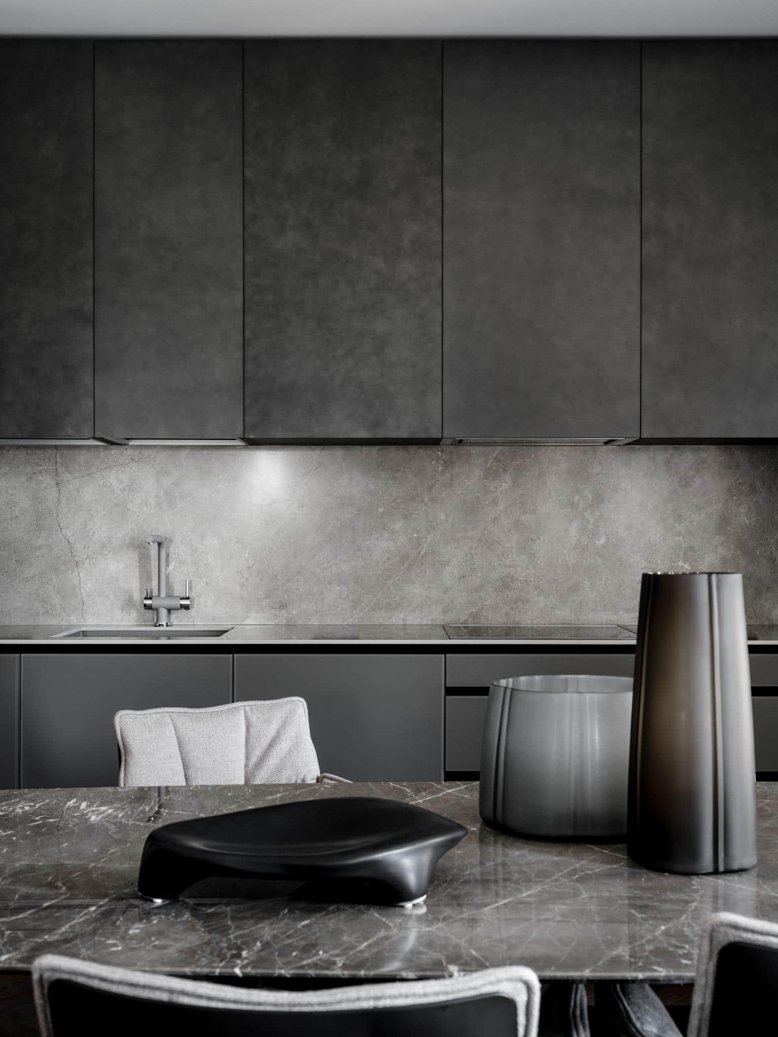 Minimalist Kitchen Cabinets And Marble Table Minimalist kitchen cabinets and marble table.