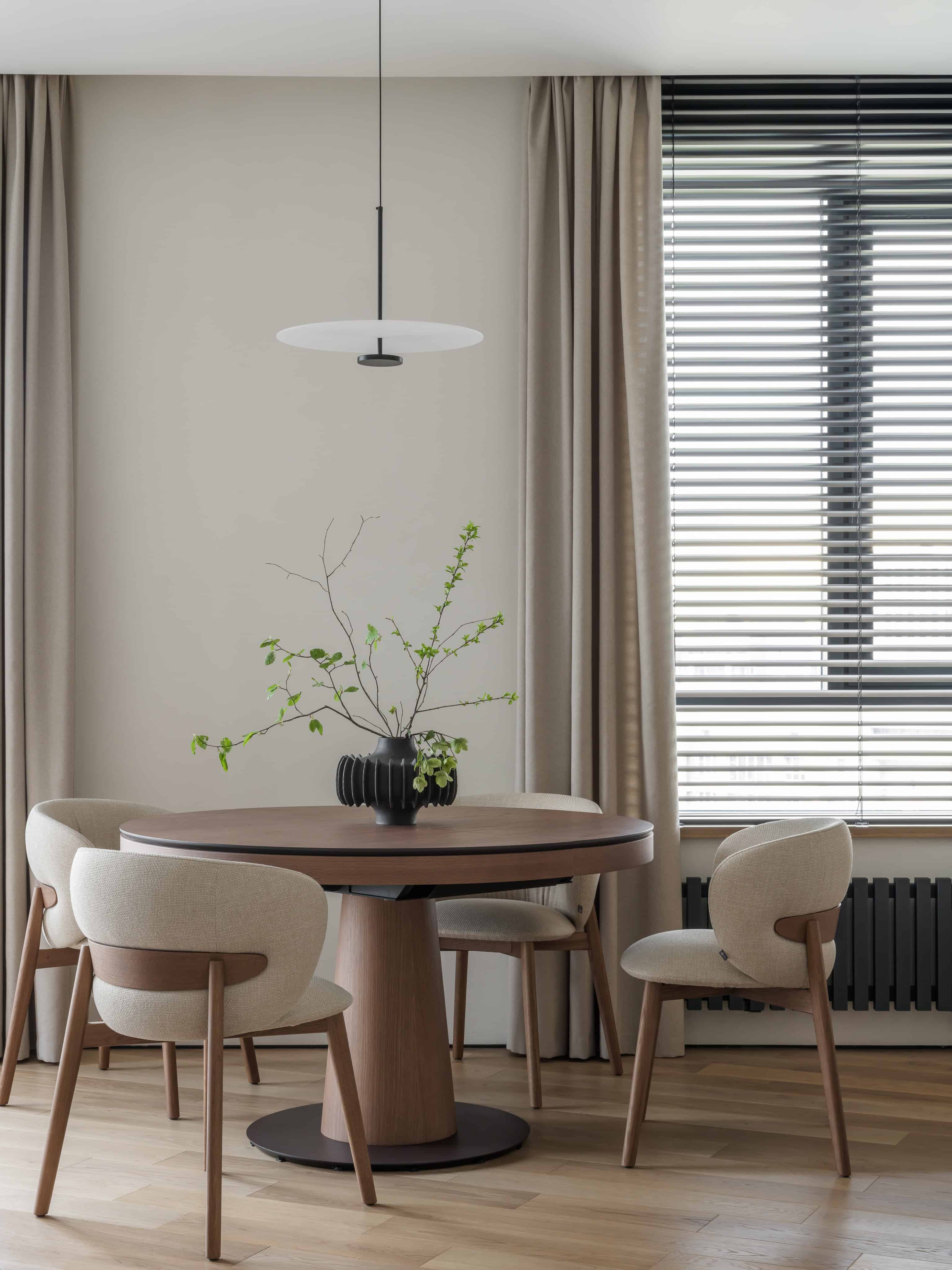 Minimalist Modern Dining Kitchen Design 7 Elegant bar counter design with two dark wooden stools and clean-lined faucet fixtures.